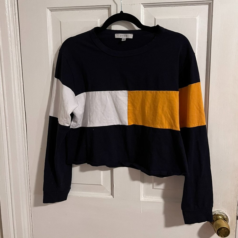Long sleeve navy, white, and yellow crop top